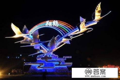 黑龙江鹤岗市，有多少人口,土地面积是多少啊？